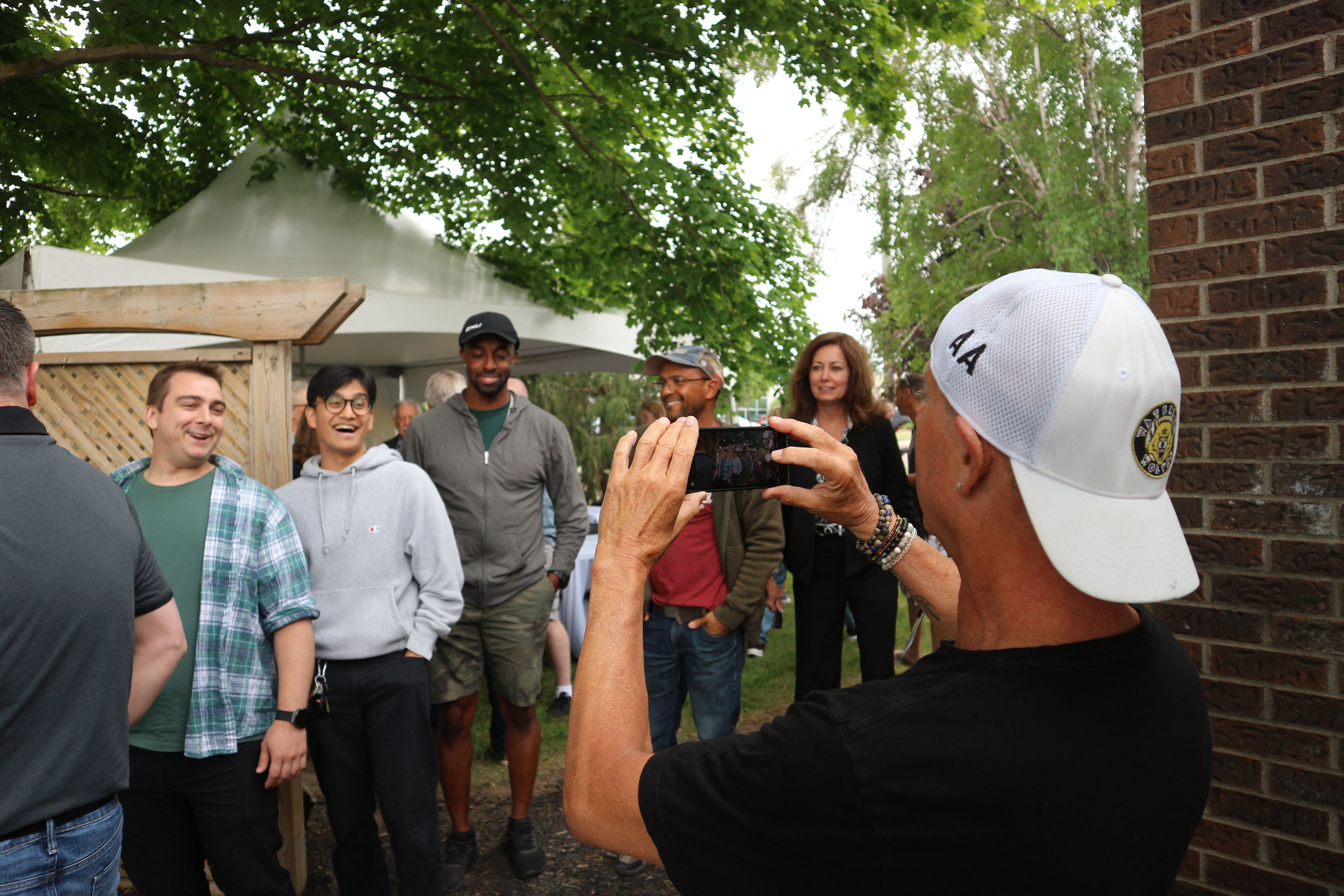 Several Septimatech employees posing for a photo at a team event